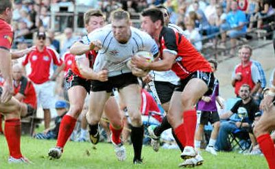 Big Bellingen centre Matt Bush makes a break in last year’s clash with The Thunder. Big Bellingen centre Matt Bush makes a break in last year’s clash with The Thunder.